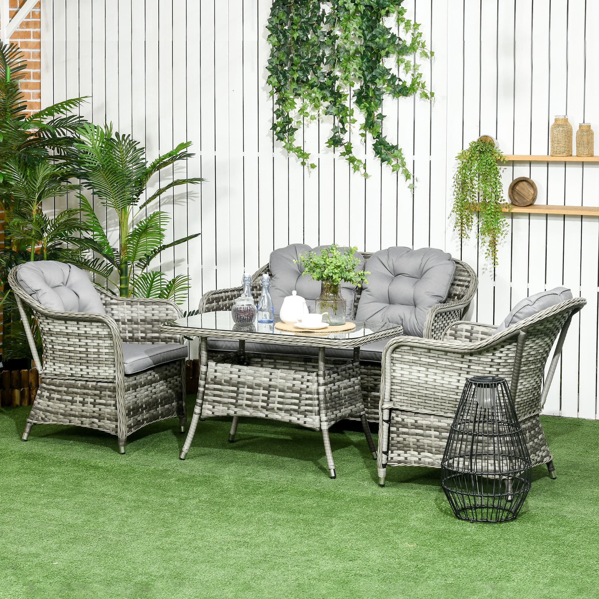 Transform Your Garden with this Grey 4-Piece Rattan Set - image 1