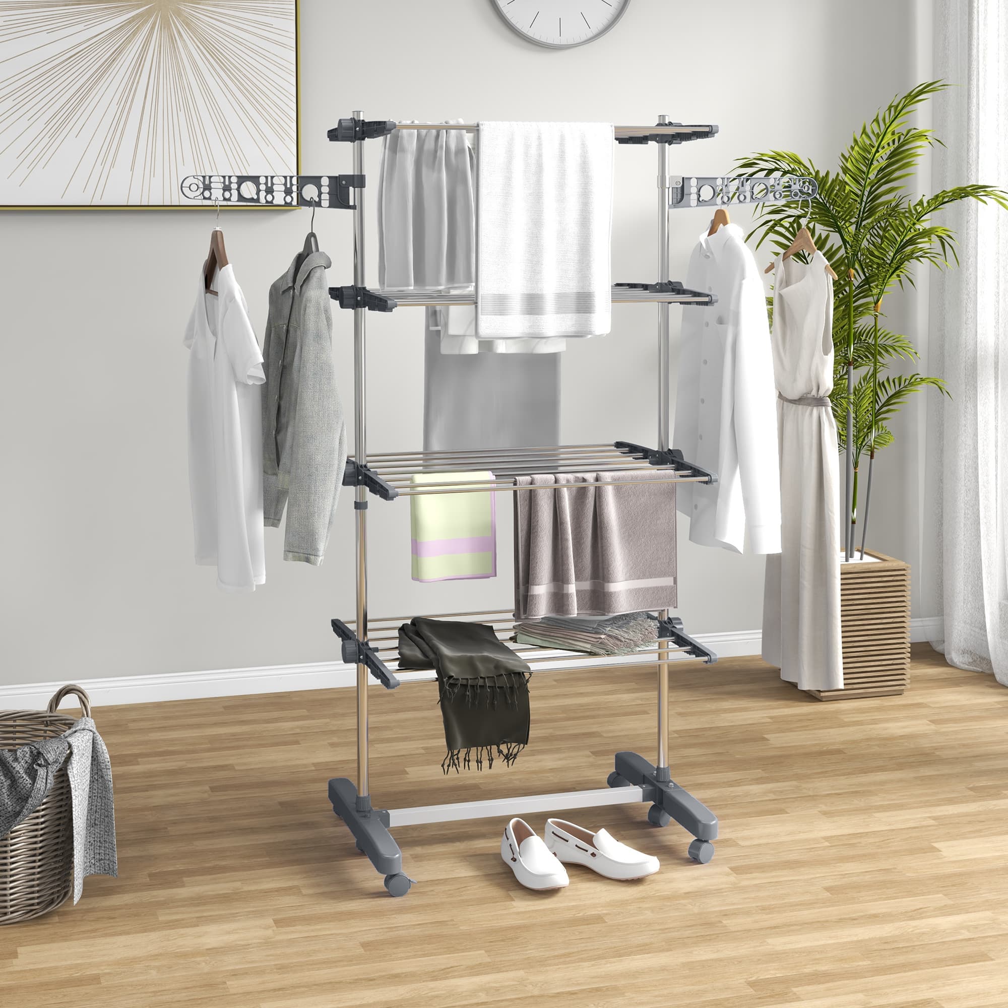 A Freestanding Clothes Airer with Four Shelves and Folding Arms - image 1