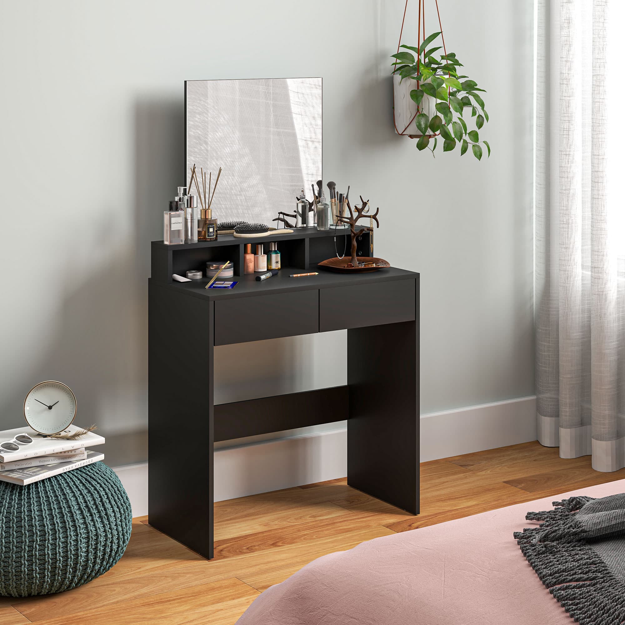 A compact black dressing table with mirror and built-in storage - image 1