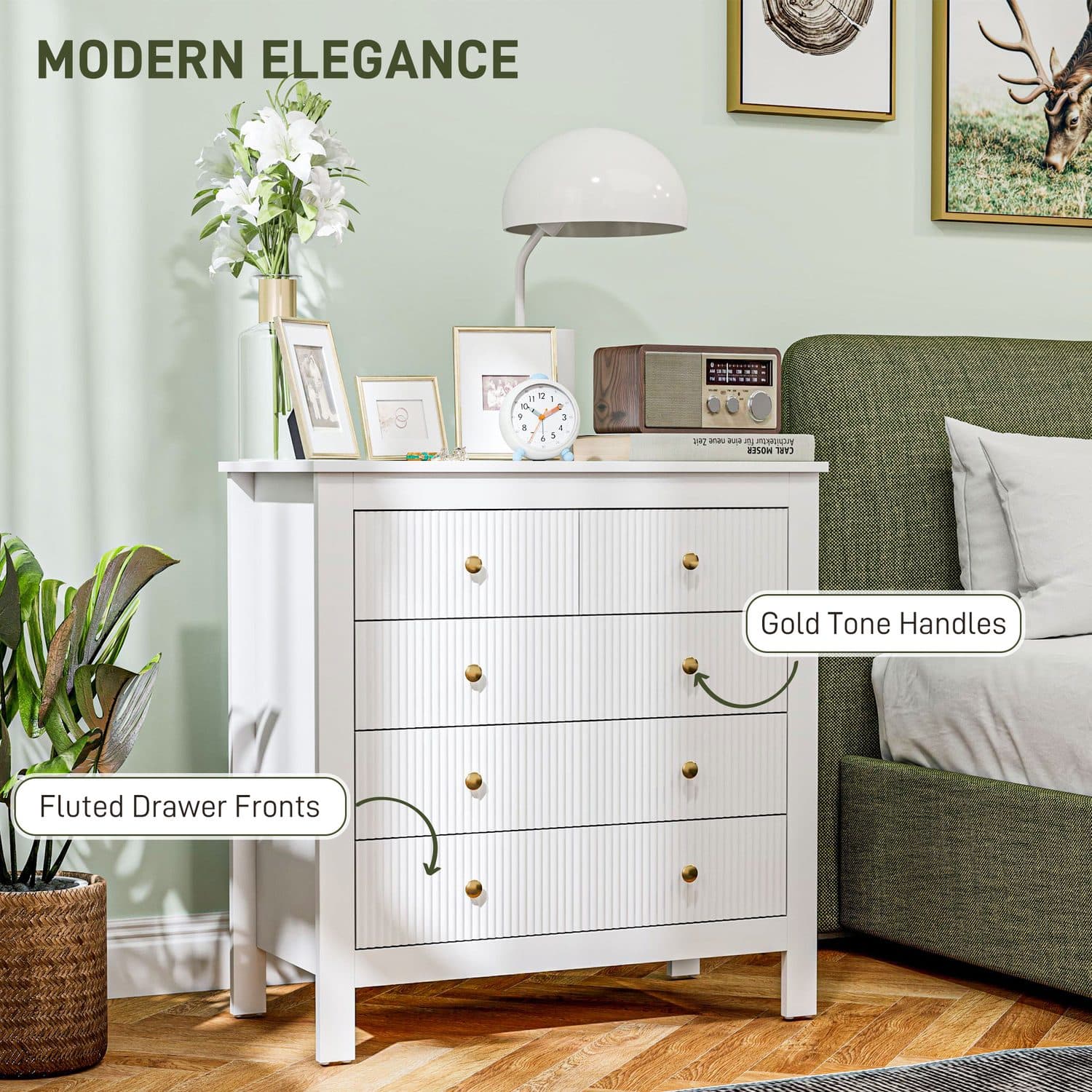 White chest of five drawers with reeded vertical fronts and gold-tone circular handles, on raised legs