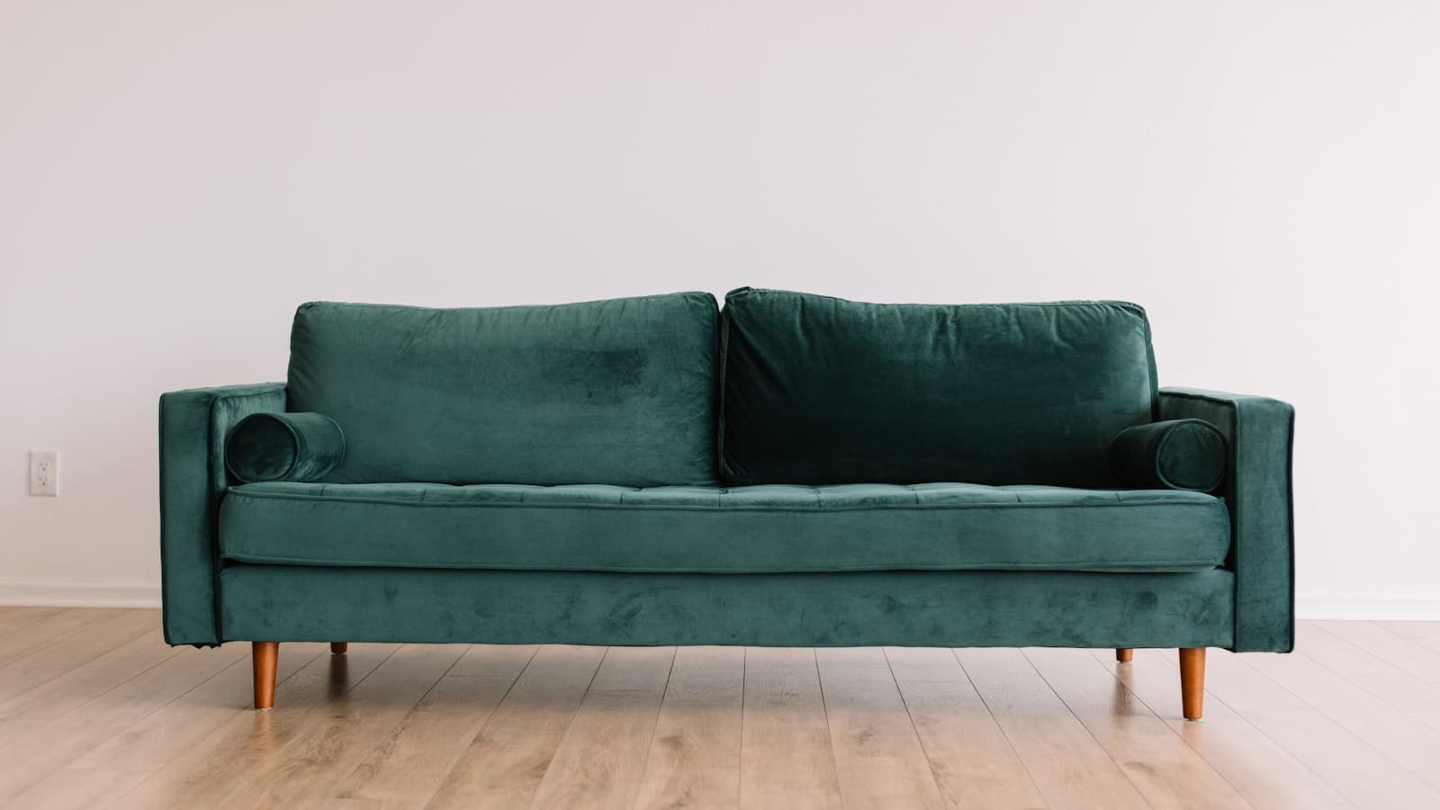 U-shaped modular sofa in soft chenille filling a family living room
