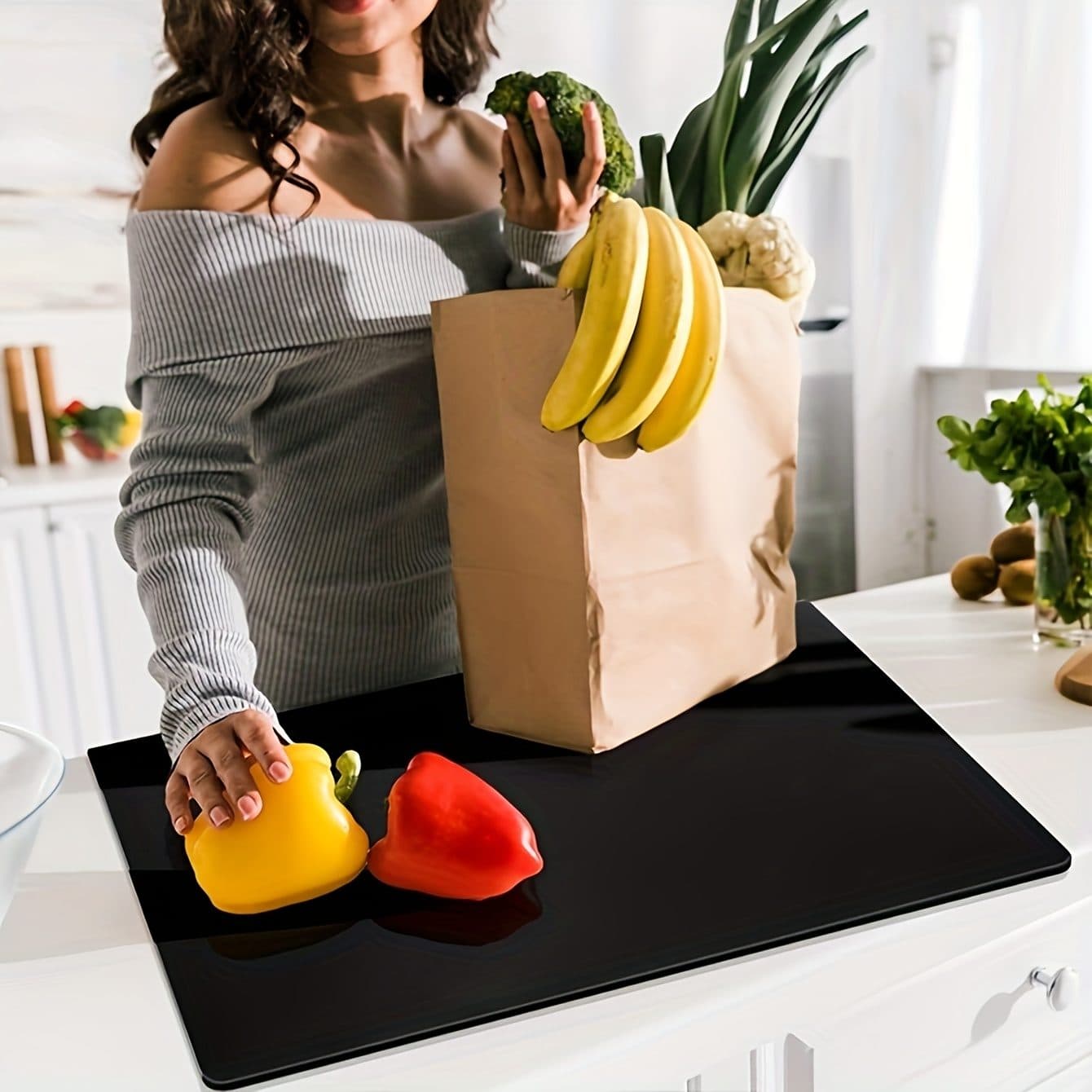 A sleek black cutting board for cleaner prep space - image 6