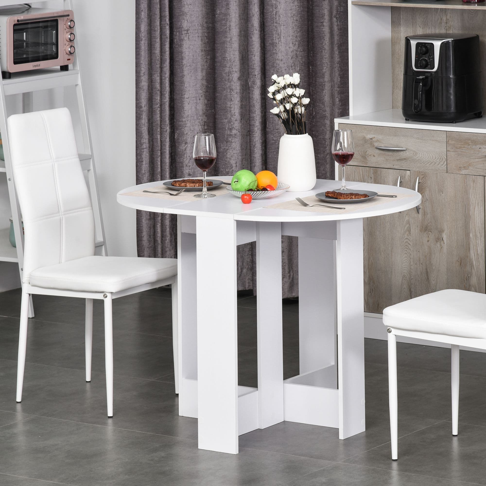 Versatile White Folding Dining Table for Compact Living - image 1
