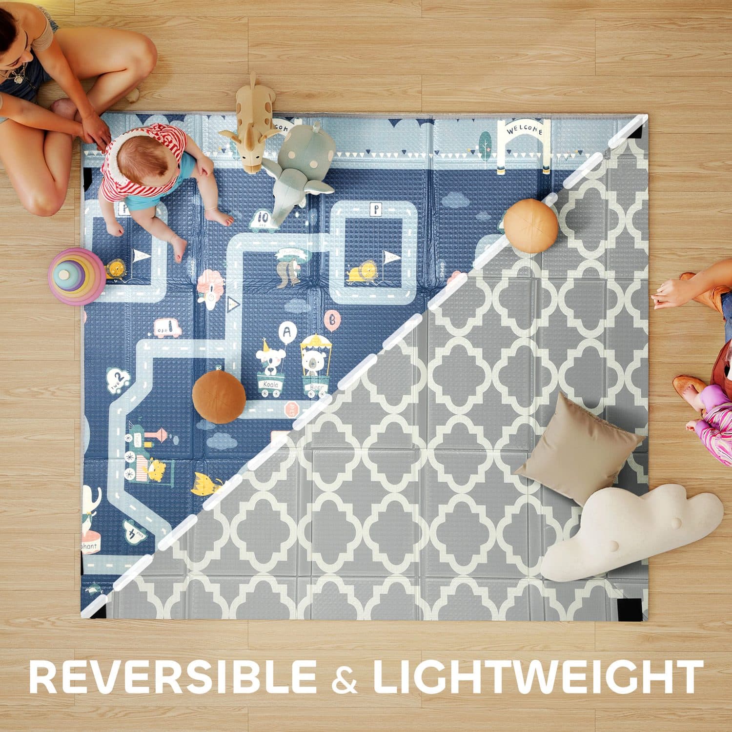 A padded reversible play mat for crawling and floor play - image 1