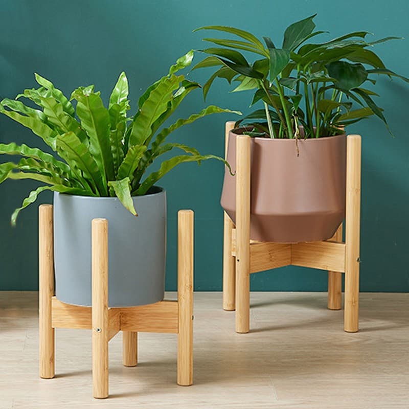 Show off indoor plants on a bamboo pot stand - image 1