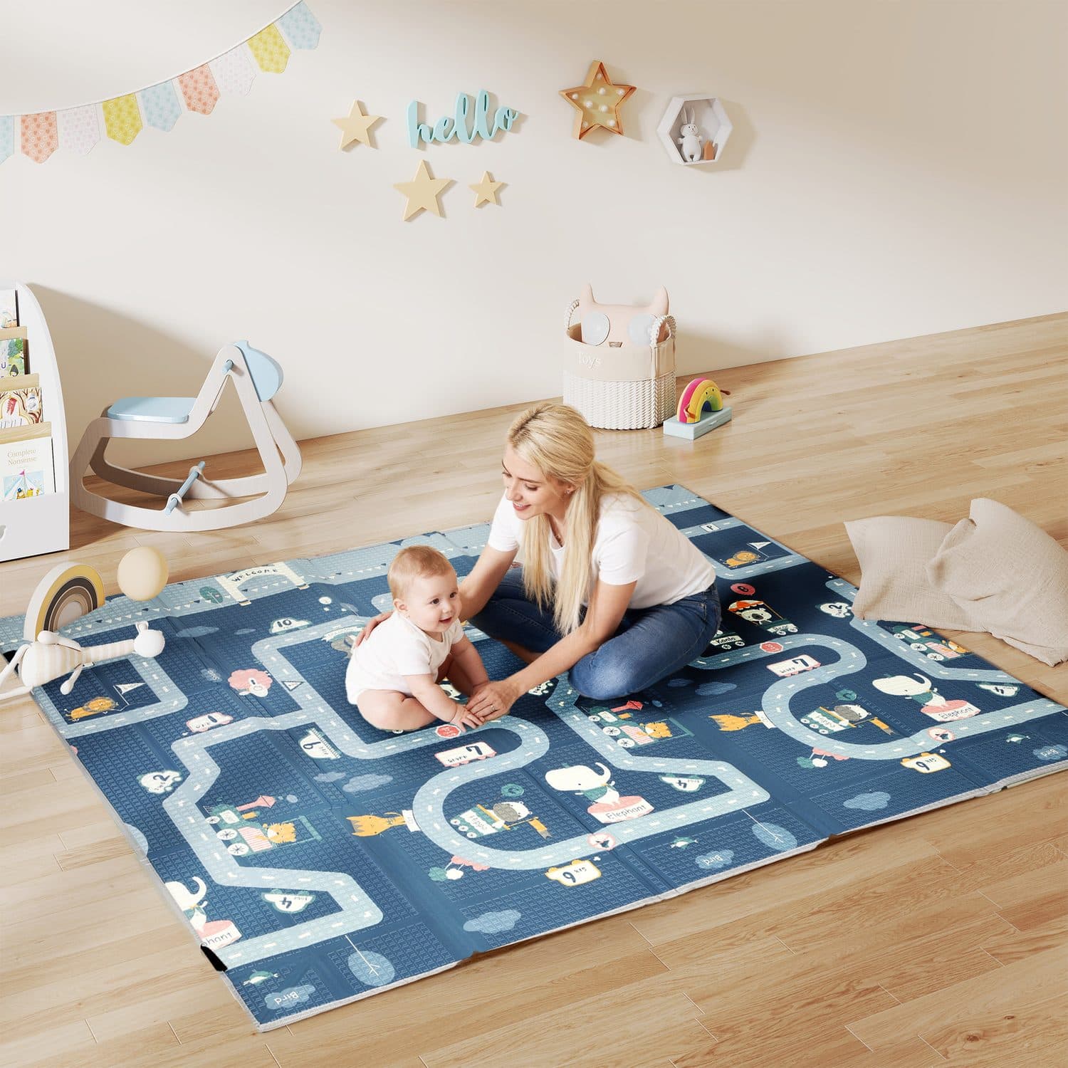 A padded reversible play mat for crawling and floor play - image 2