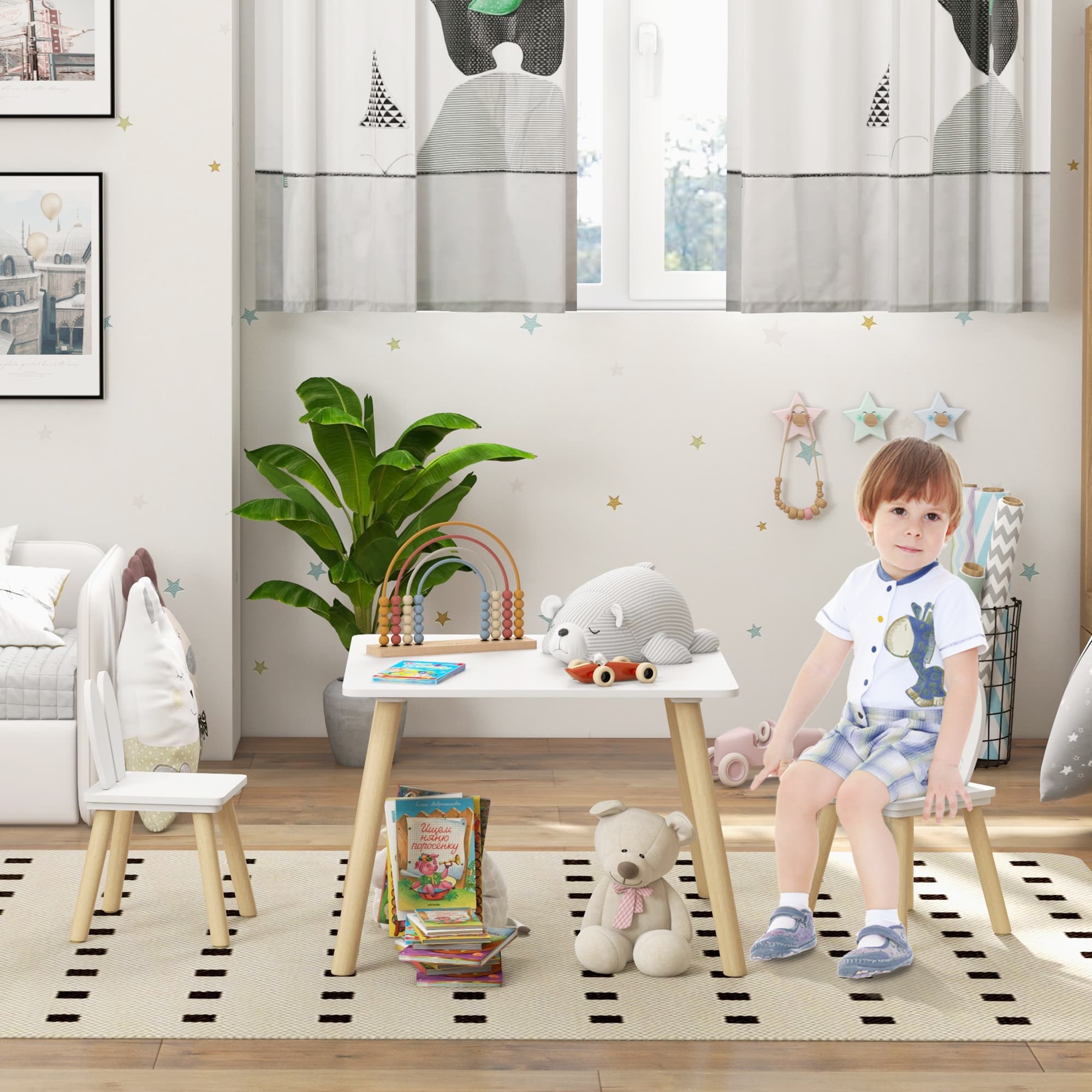 A Three-Piece Kids Table Set with Playful Bunny Ear Chairs - image 1