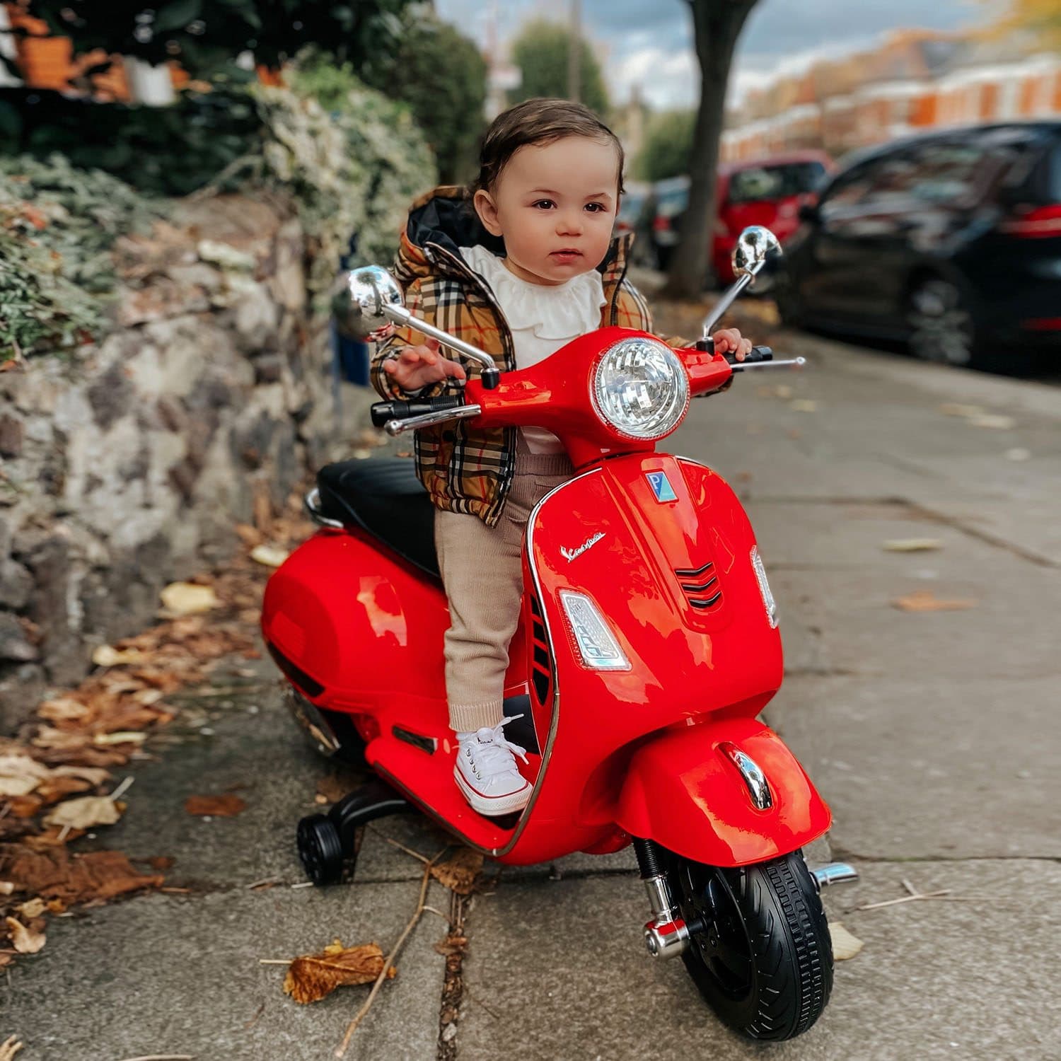 A red 6V ride-on scooter for young riders - image 1