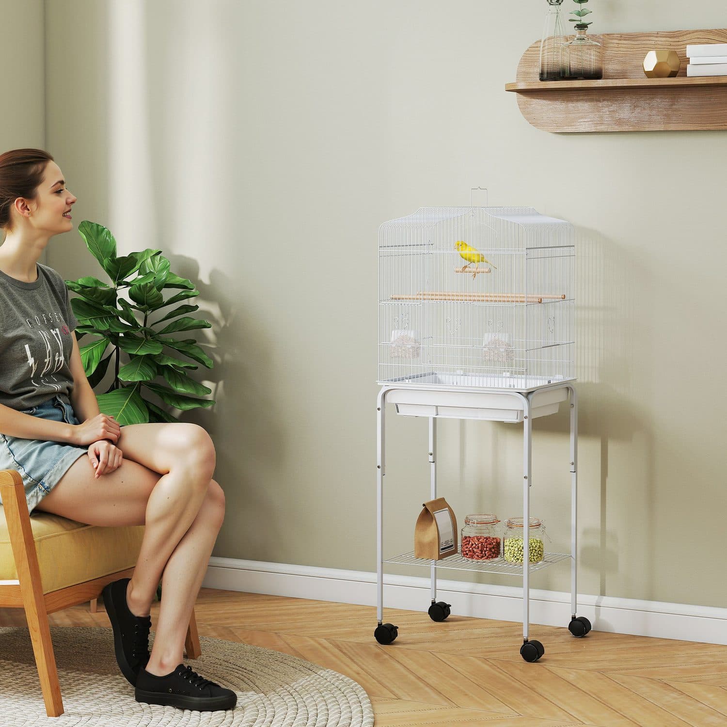 A Spacious Bird Cage on Wheels with Wooden Perches - image 5